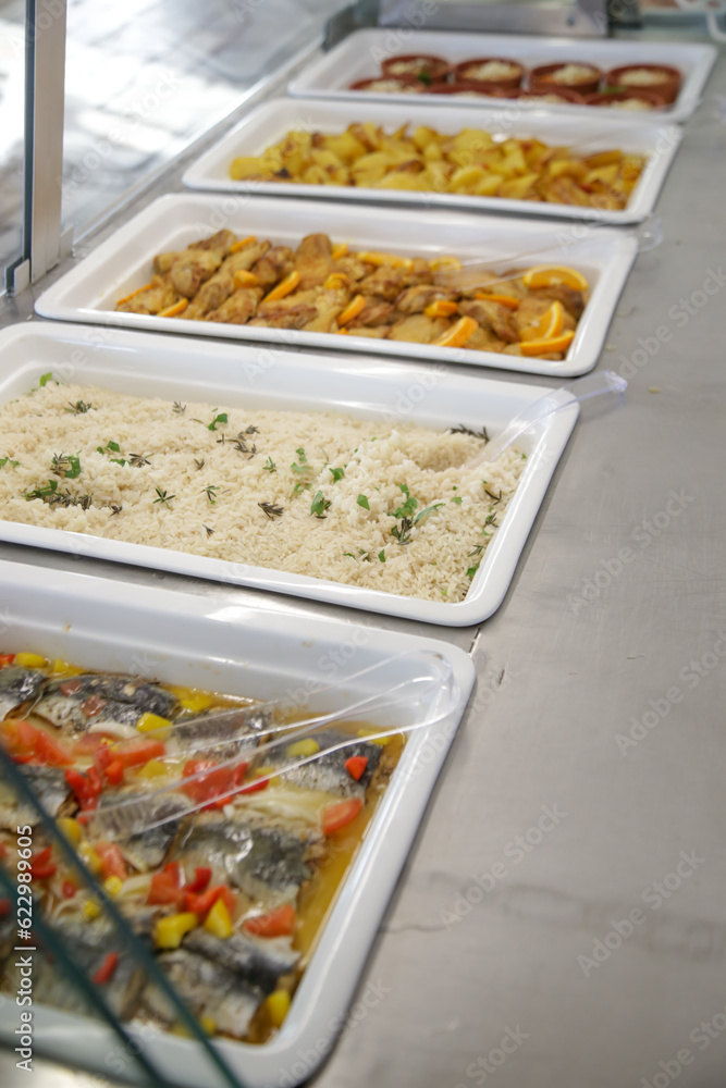 Various food served on a buffet line Various food served on a buffet line
