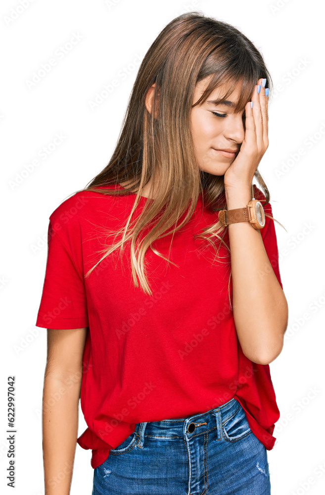 Teenager caucasian girl wearing casual red t shirt yawning tired covering half face, eye and mouth with hand. face hurts in pain. Teenager caucasian girl wearing casual red t shirt yawning tired covering half face, eye and mouth with hand. face hurts in pain.