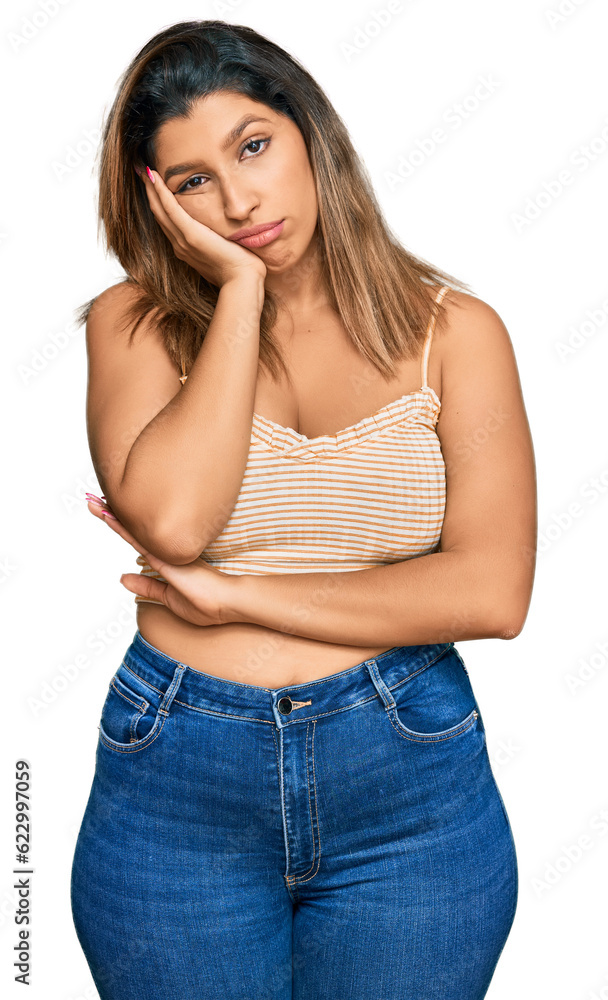 Beautiful brunette woman wearing casual clothes thinking looking tired and bored with depression problems with crossed arms. Beautiful brunette woman wearing casual clothes thinking looking tired and bored with depression problems with crossed arms.