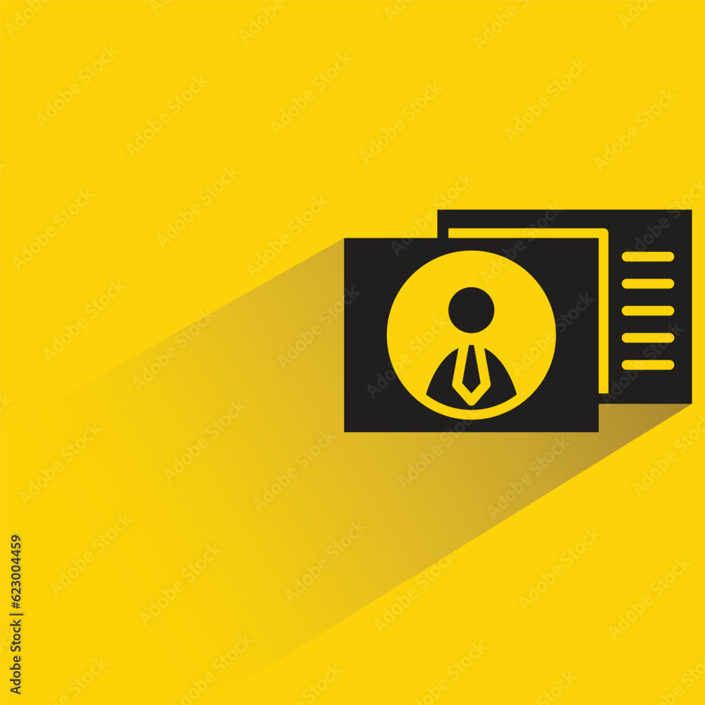 employee id card with shadow on yellow background employee id card with shadow on yellow background