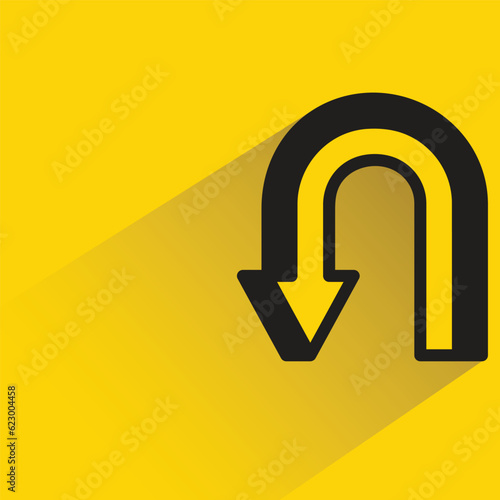 turn down arrow symbol with shadow on yellow background