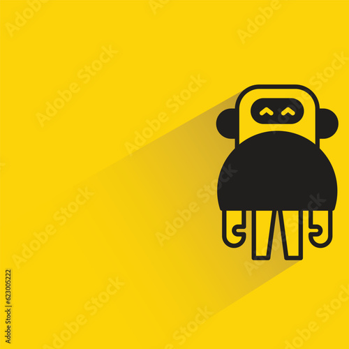 cute robot with shadow on yellow background