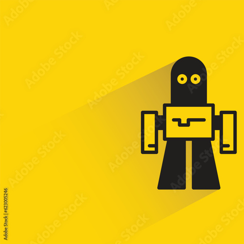 cute robot with shadow on yellow background