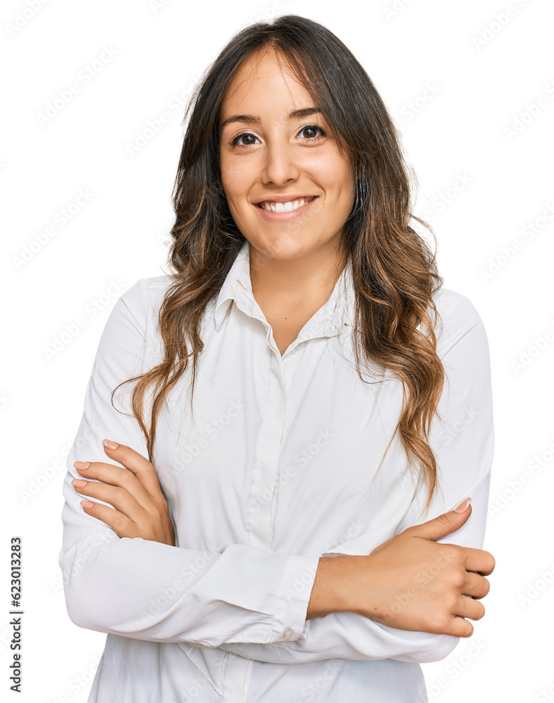Young brunette woman wearing casual clothes happy face smiling with crossed arms looking at the camera. positive person. Young brunette woman wearing casual clothes happy face smiling with crossed arms looking at the camera. positive person.