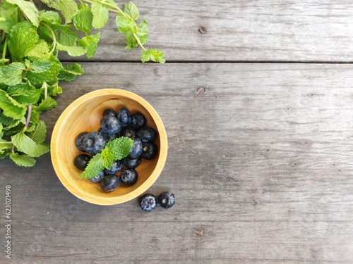 Fototapeta Naklejka Na Ścianę i Meble -  Blueberry fruit on the bowl