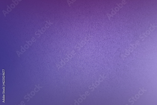 Purple or violet color tone paint on environmental friendly recycled blank cardboard box or corrugated paper texture background with space