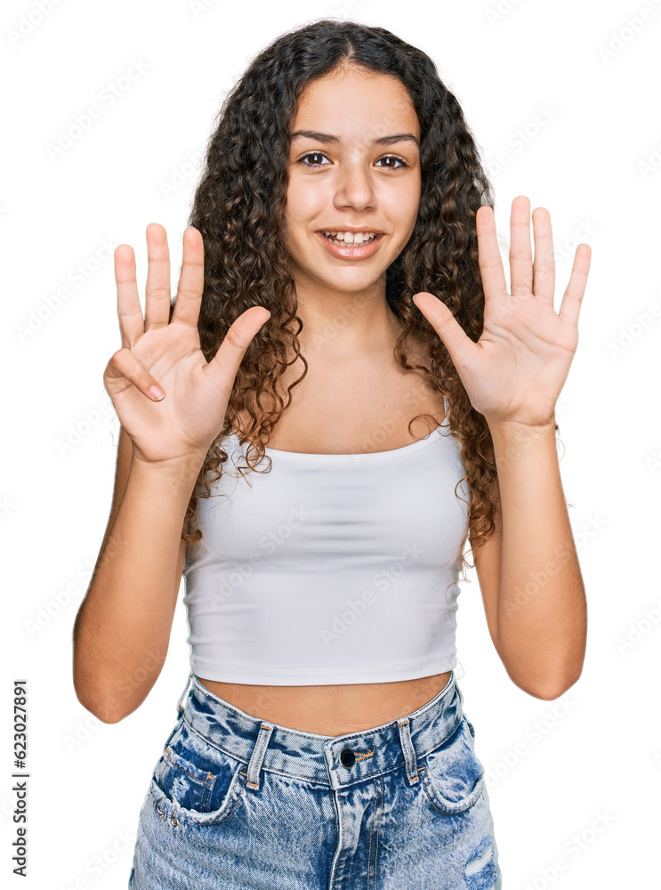 Teenager hispanic girl wearing casual clothes showing and pointing up with fingers number nine while smiling confident and happy. Teenager hispanic girl wearing casual clothes showing and pointing up with fingers number nine while smiling confident and happy.