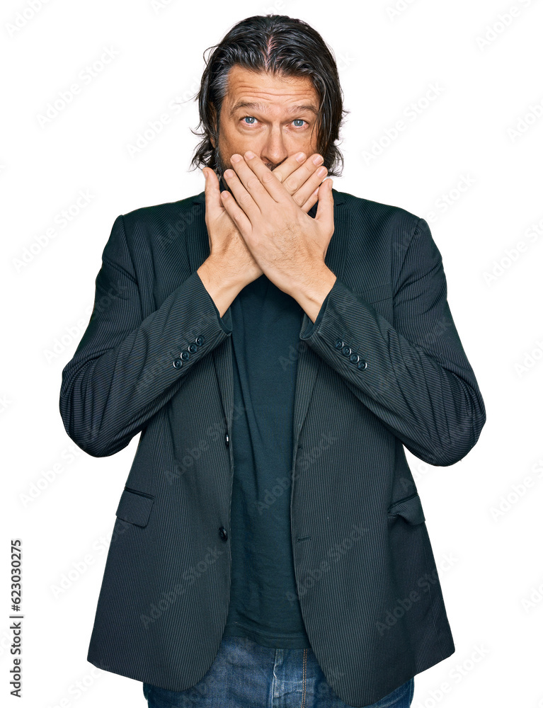 Middle age handsome man wearing business clothes shocked covering mouth with hands for mistake. secret concept. Middle age handsome man wearing business clothes shocked covering mouth with hands for mistake. secret concept.