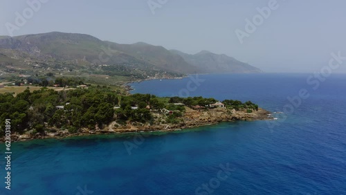 Rocky cliffs at Guidaloca beach in Trapani Sicily Italy Aerial view photo