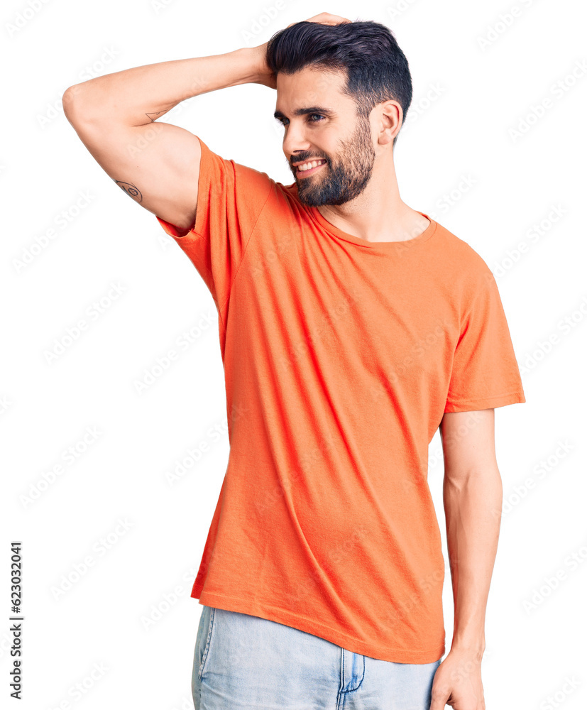 Young handsome man with beard wearing casual t-shirt smiling confident touching hair with hand up gesture, posing attractive and fashionable Young handsome man with beard wearing casual t-shirt smiling confident touching hair with hand up gesture, posing attractive and fashionable