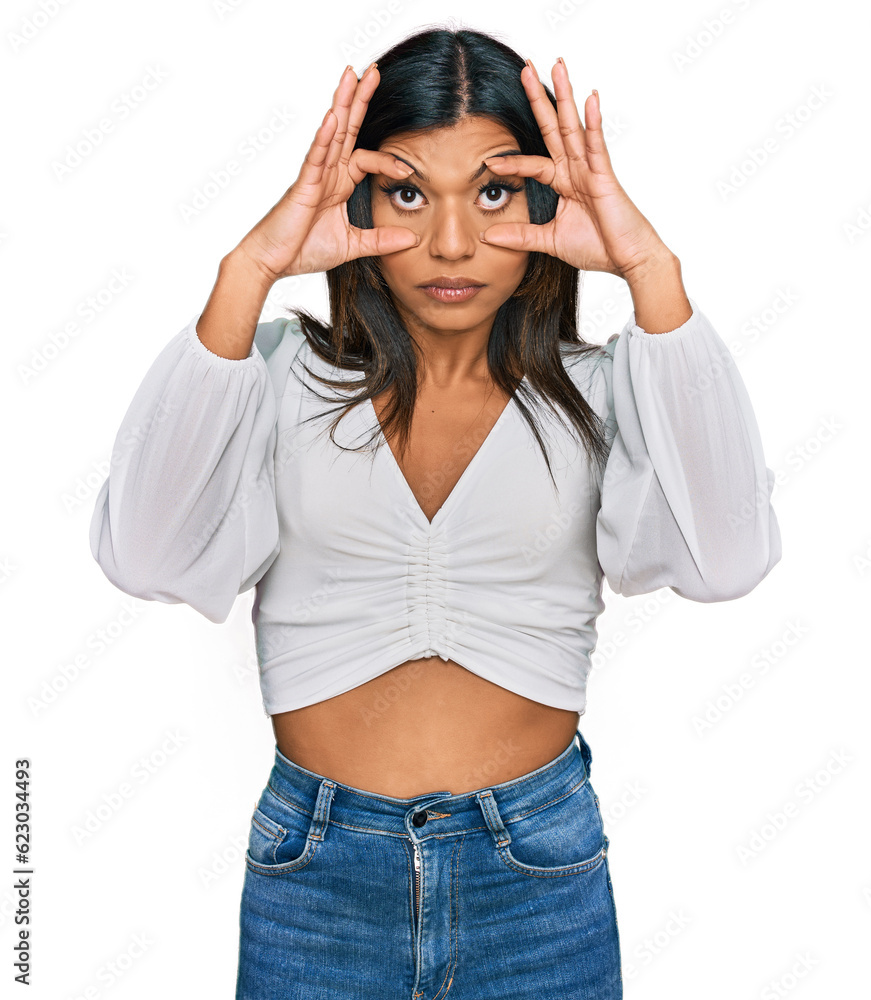 Young latin transsexual transgender woman wearing casual clothes trying to open eyes with fingers, sleepy and tired for morning fatigue Young latin transsexual transgender woman wearing casual clothes trying to open eyes with fingers, sleepy and tired for morning fatigue
