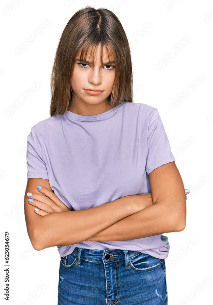 Teenager caucasian girl wearing casual clothes skeptic and nervous, disapproving expression on face with crossed arms. negative person. Teenager caucasian girl wearing casual clothes skeptic and nervous, disapproving expression on face with crossed arms. negative person.