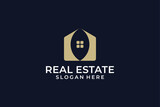 Real estate construction logo with golden negative space