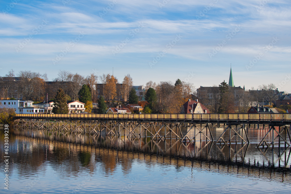 Fototapeta premium Wooden bridge over the river Nidelven, Trondheim, Norway.