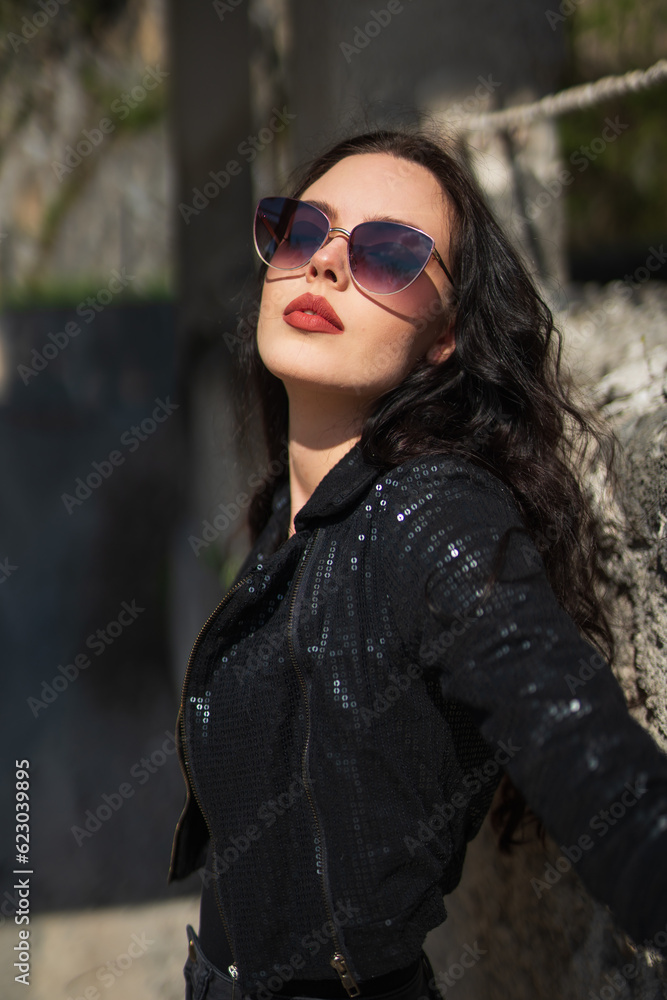 portrait of beautiful girl with glasses and dark hair. selective focus