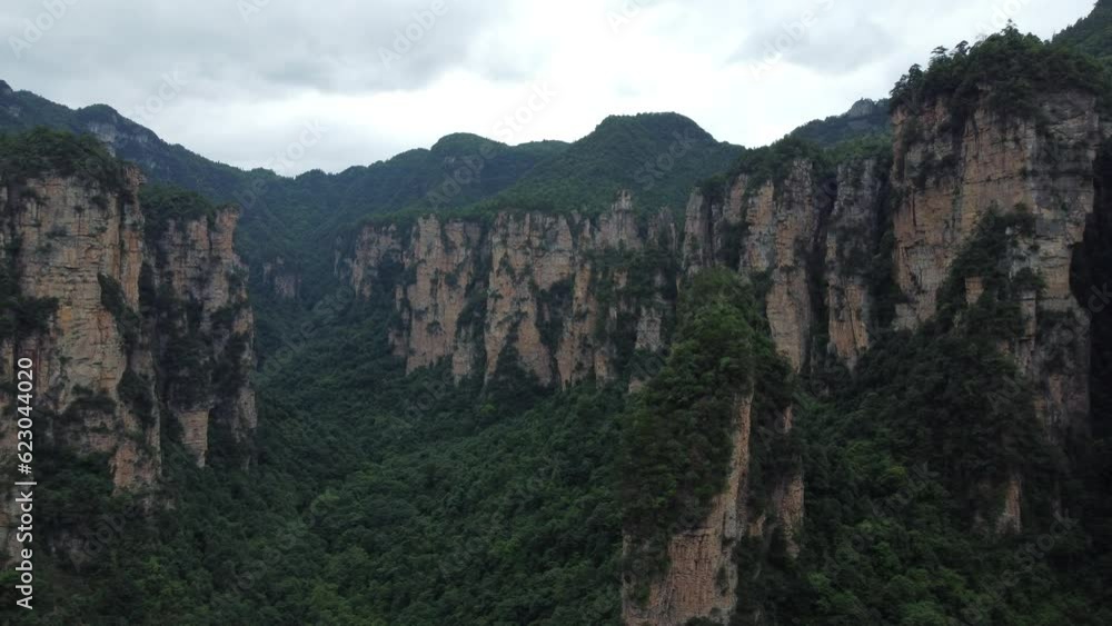 4K Drone Flying Through The Spectacular Grand Canyon Of Zhangjiajie National Park, China; Natural Wonders Of The World. 4K Drone Flying Through The Spectacular Grand Canyon Of Zhangjiajie National Park, China; Natural Wonders Of The World.