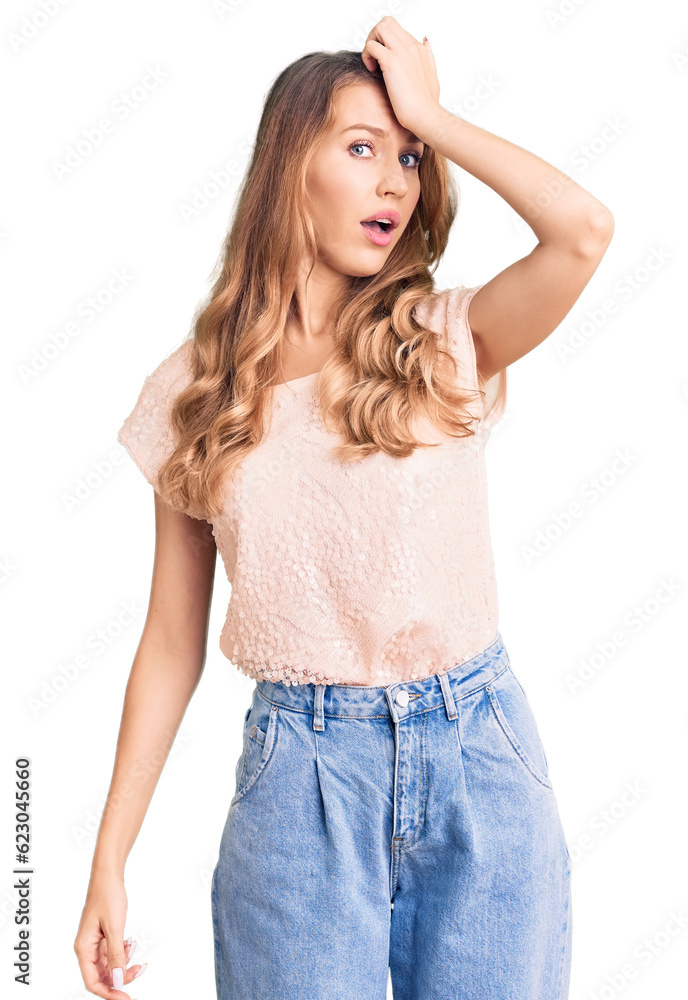 Young beautiful caucasian woman with blond hair wearing casual clothes surprised with hand on head for mistake, remember error. forgot, bad memory concept. Young beautiful caucasian woman with blond hair wearing casual clothes surprised with hand on head for mistake, remember error. forgot, bad memory concept.