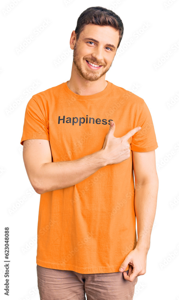 Handsome young man with bear wearing tshirt with happiness word message cheerful with a smile on face pointing with hand and finger up to the side with happy and natural expression Handsome young man with bear wearing tshirt with happiness word message cheerful with a smile on face pointing with hand and finger up to the side with happy and natural expression