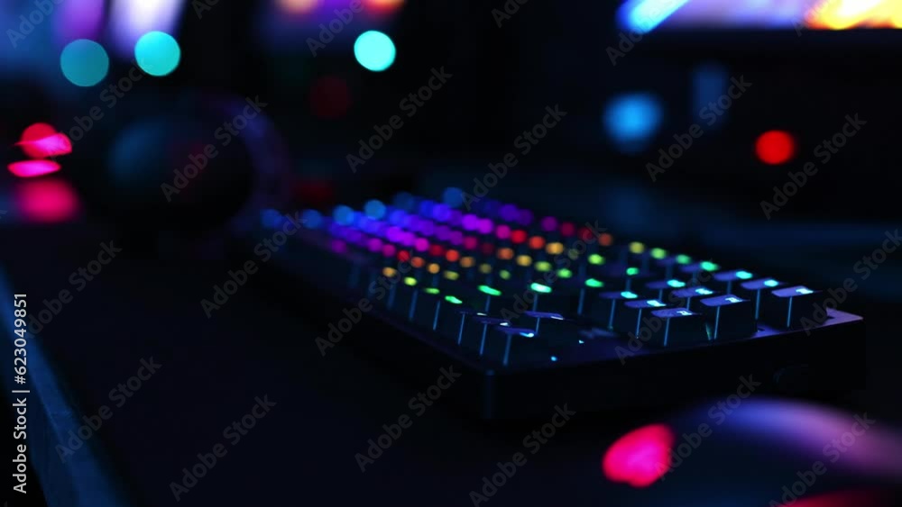 Computer keyboard with neon backlight for esports, the concept of a professional game Computer keyboard with neon backlight for esports, the concept of a professional game