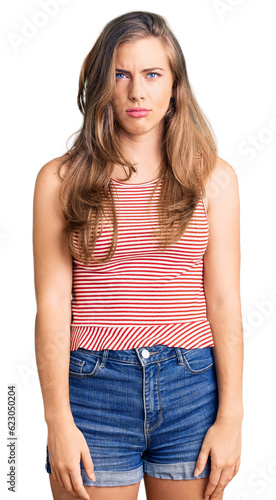 Beautiful caucasian young woman wearing casual clothes skeptic and nervous, frowning upset because of problem. negative person.
