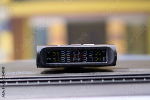 close up of tire pressure monitor, car tyre pressure, TPMS photo