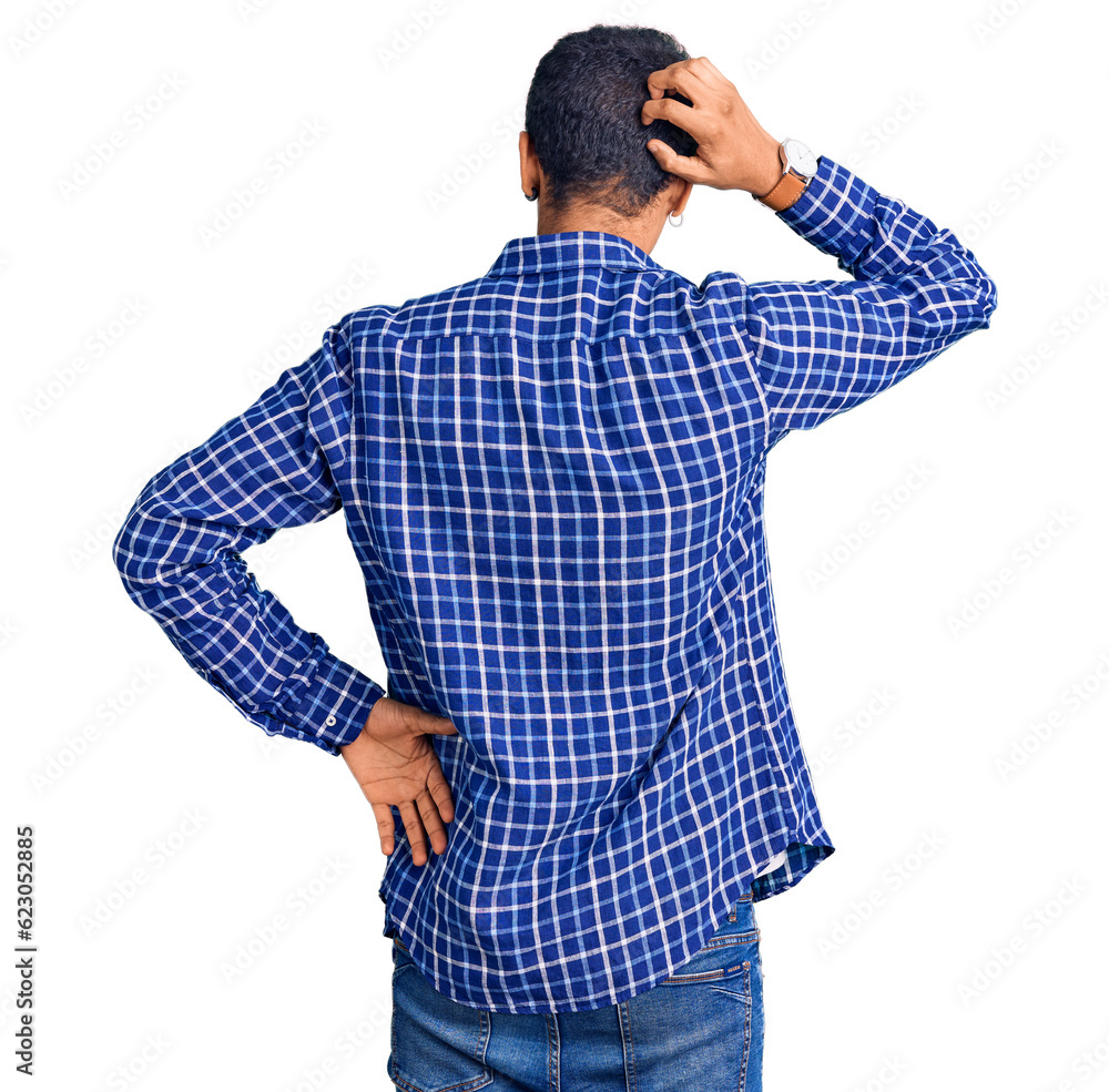 Young african amercian man wearing casual clothes backwards thinking about doubt with hand on head Young african amercian man wearing casual clothes backwards thinking about doubt with hand on head