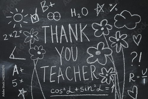 Black school board with chalk inscription "Thank you teacher!"
