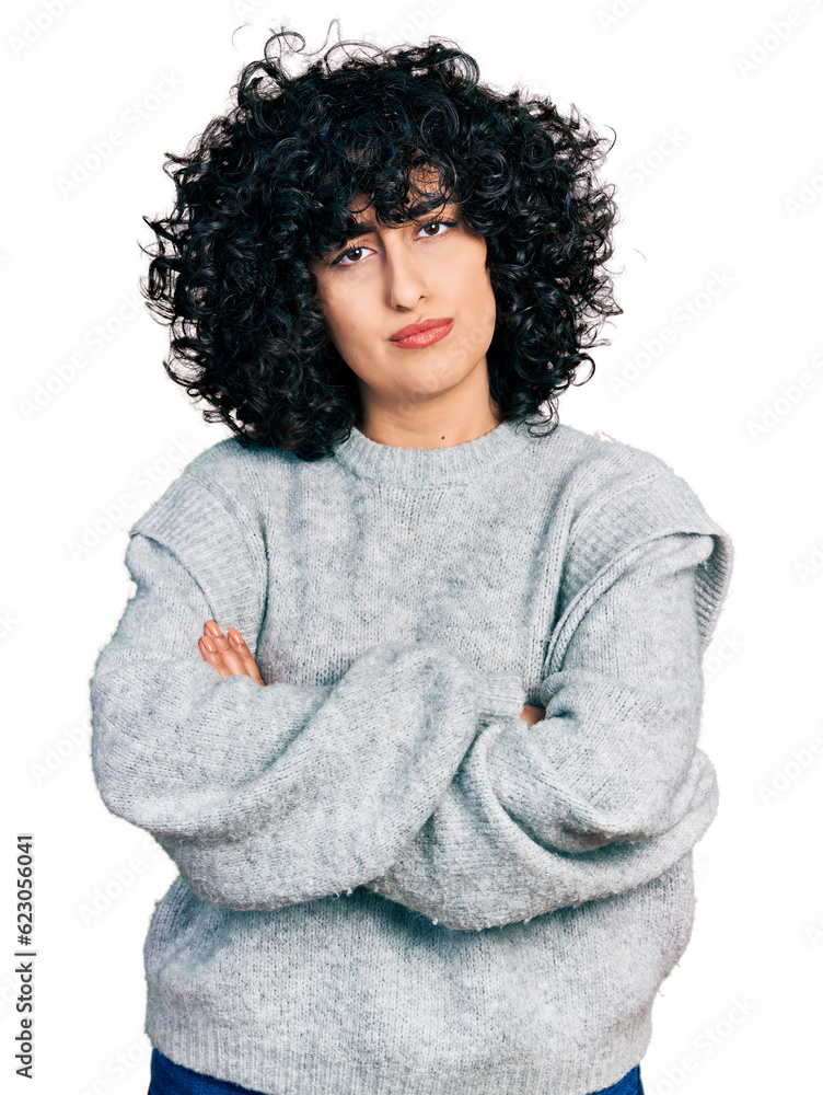 Young middle east girl wearing casual clothes skeptic and nervous, disapproving expression on face with crossed arms. negative person. Young middle east girl wearing casual clothes skeptic and nervous, disapproving expression on face with crossed arms. negative person.