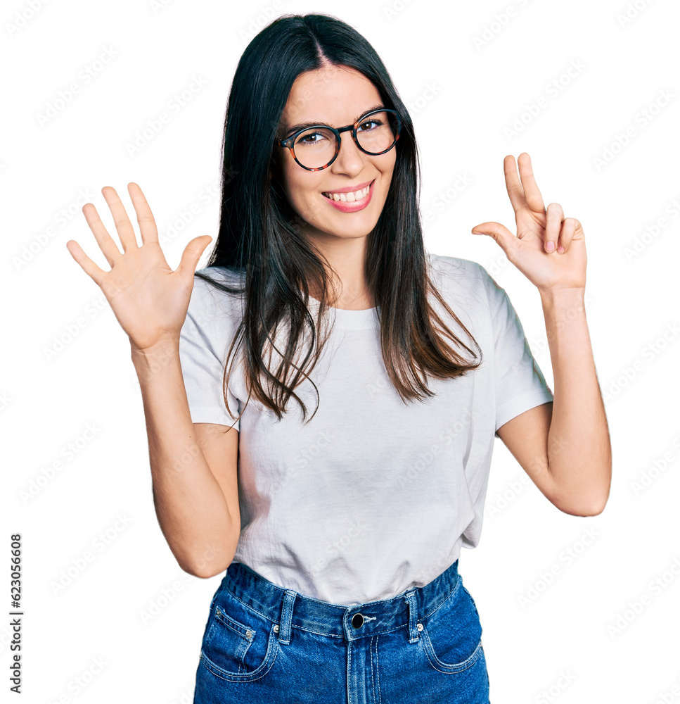 Young hispanic woman wearing casual clothes and glasses showing and pointing up with fingers number eight while smiling confident and happy. Young hispanic woman wearing casual clothes and glasses showing and pointing up with fingers number eight while smiling confident and happy.