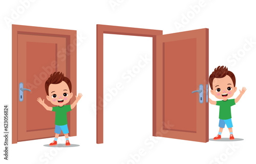 little kid standing and holding door knob