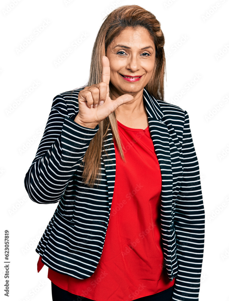 Middle age latin woman wearing business jacket smiling with an idea or question pointing finger up with happy face, number one Middle age latin woman wearing business jacket smiling with an idea or question pointing finger up with happy face, number one