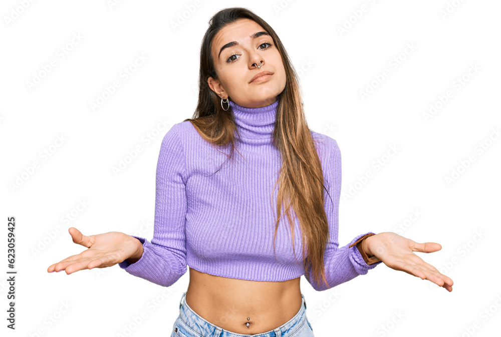 Young hispanic woman wearing casual clothes clueless and confused with open arms, no idea concept. Young hispanic woman wearing casual clothes clueless and confused with open arms, no idea concept.