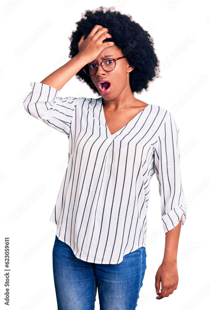 Young african american woman wearing casual clothes and glasses surprised with hand on head for mistake, remember error. forgot, bad memory concept. Young african american woman wearing casual clothes and glasses surprised with hand on head for mistake, remember error. forgot, bad memory concept.