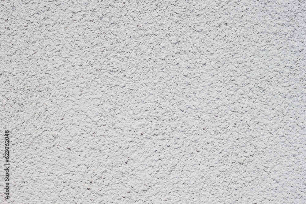 Texture of decorative plaster with a relief. White plaster. Close-up. Texture of decorative plaster with a relief. White plaster. Close-up.