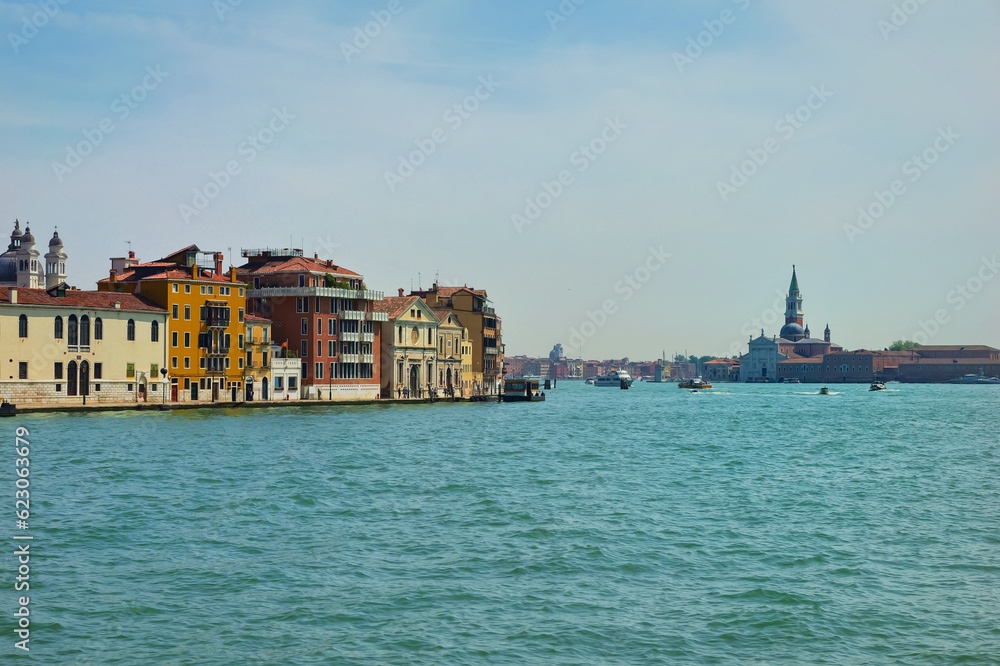 View of the Venetian Lagoon and active ship navigation on it, Venice, Italy.