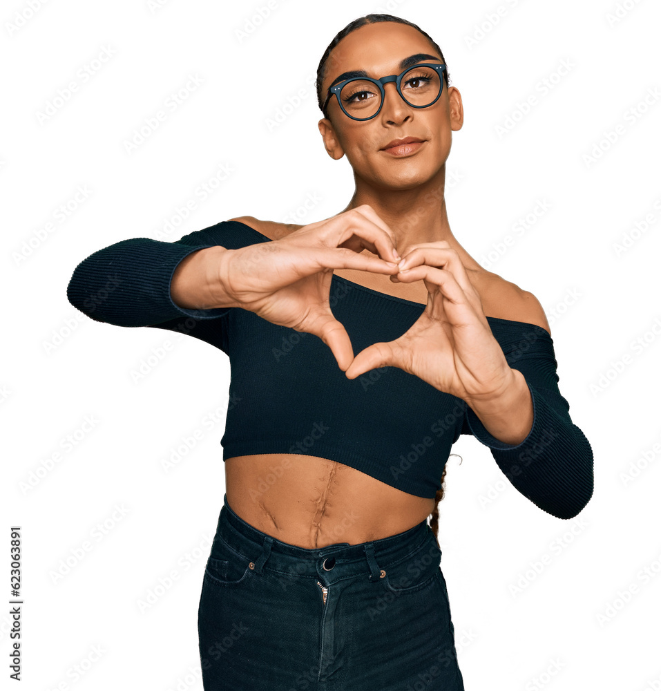 Φωτογραφία Hispanic transgender man wearing make up and long hair wearing women clothes smiling in love doing heart symbol shape with hands