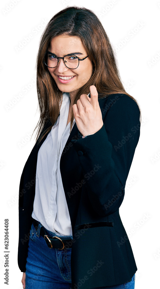 Young caucasian girl wearing business style and glasses beckoning come here gesture with hand inviting welcoming happy and smiling Young caucasian girl wearing business style and glasses beckoning come here gesture with hand inviting welcoming happy and smiling