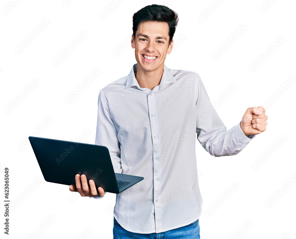 Young hispanic business man working using computer laptop screaming proud, celebrating victory and success very excited with raised arm Young hispanic business man working using computer laptop screaming proud, celebrating victory and success very excited with raised arm