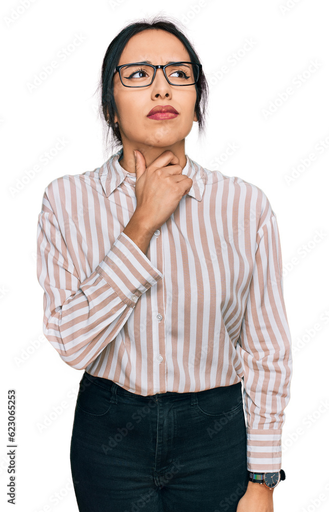 Young hispanic girl wearing casual clothes and glasses touching painful neck, sore throat for flu, clod and infection