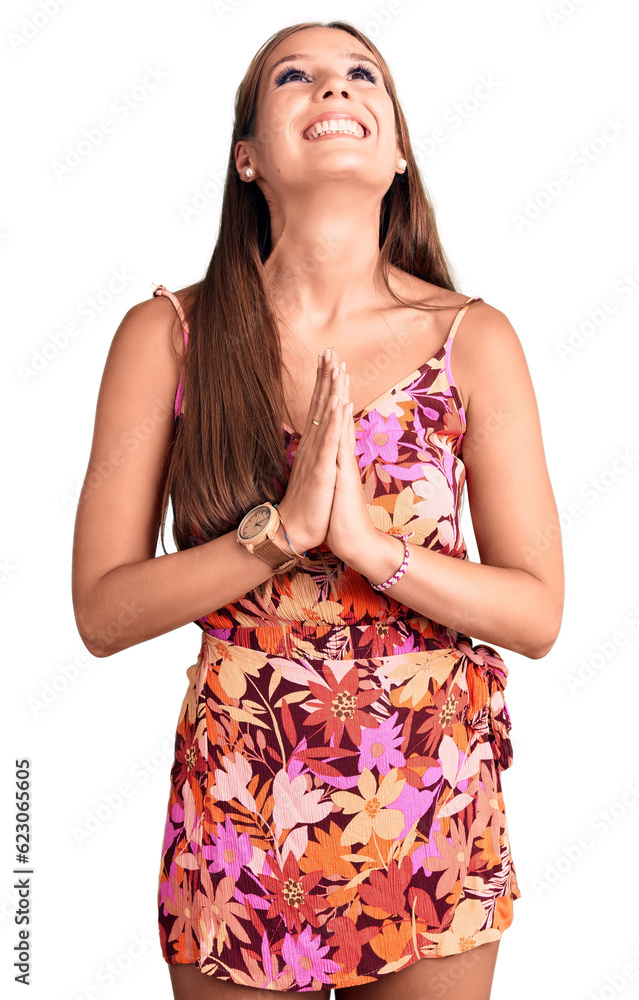 Young beautiful hispanic woman wearing casual clothes begging and praying with hands together with hope expression on face very emotional and worried. begging. Young beautiful hispanic woman wearing casual clothes begging and praying with hands together with hope expression on face very emotional and worried. begging.