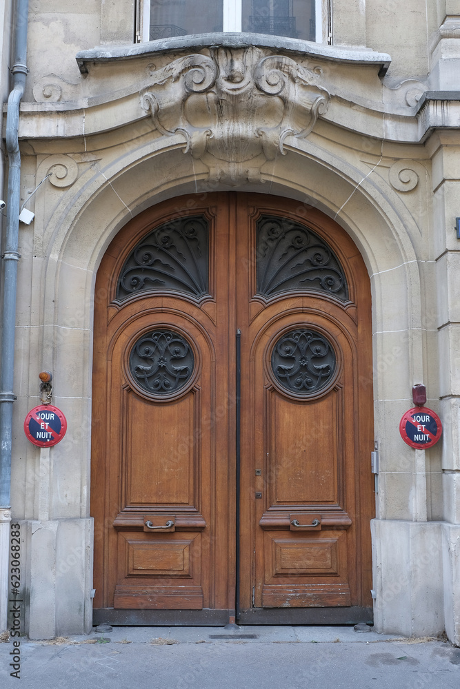 Interesting door design, with nice shapes and materials. Shot in Paris.
