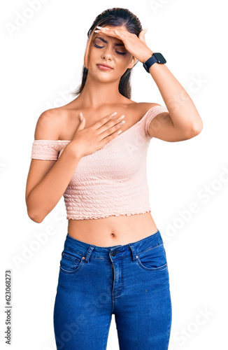 Young beautiful woman wearing casual clothes touching forehead for illness and fever  flu and cold  virus sick