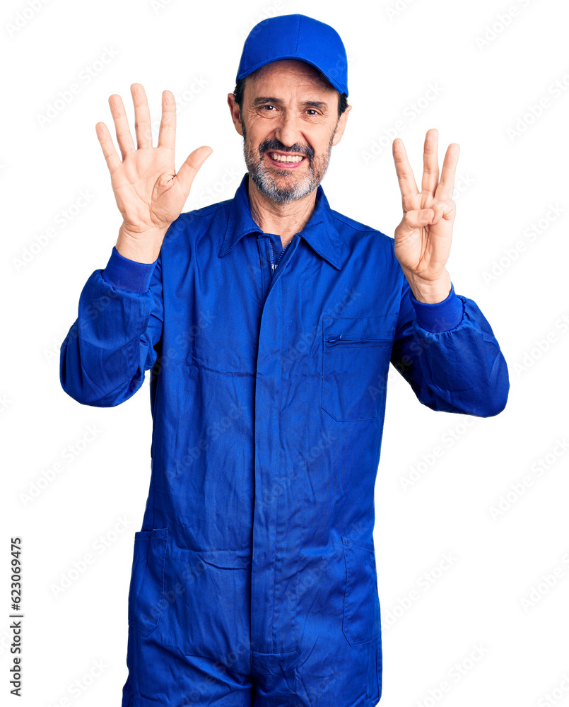 Middle age handsome man wearing mechanic uniform showing and pointing up with fingers number eight while smiling confident and happy.
