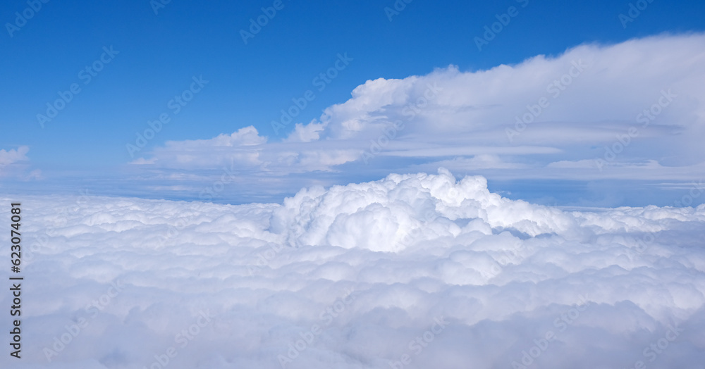 cloudscape from above. blue sky cumulus clouds. earth from above