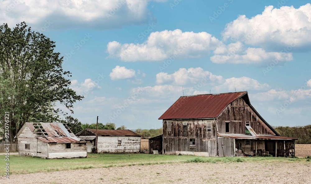 Weathered farm with a beautiful summer sky Weathered farm with a beautiful summer sky