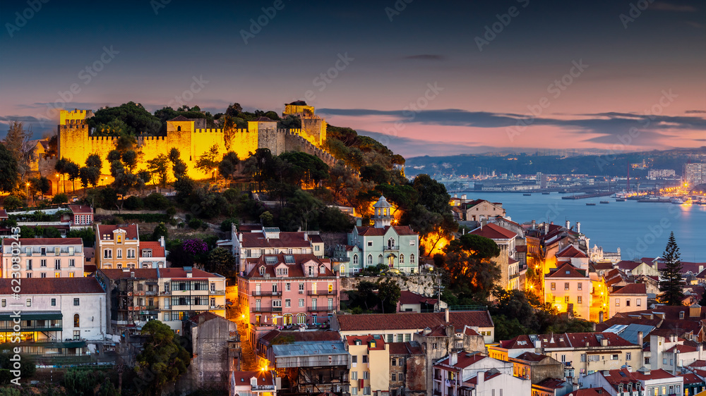 Aerial view of Lisbon cityscape during dusk time with beautiful sky , Portugal