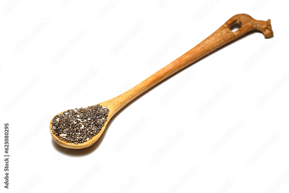 Chia seeds in wooden spoon. Healthy superfood rich in Omega 3 fatty acids. Dry healthy natural ingredient. Chia grains are falling Chia seeds in wooden spoon. Healthy superfood rich in Omega 3 fatty acids. Dry healthy natural ingredient. Chia grains are falling