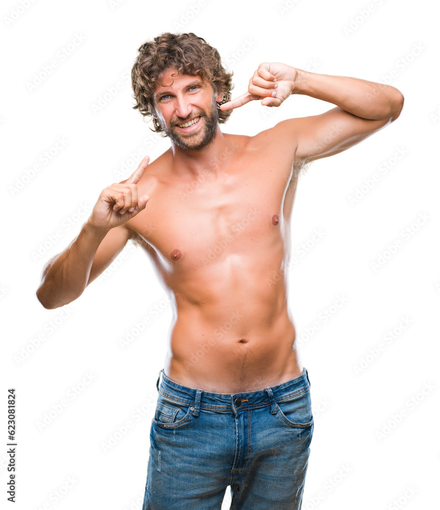 Handsome hispanic model man sexy and shirtless over isolated background smiling confident showing and pointing with fingers teeth and mouth. Health concept. Handsome hispanic model man sexy and shirtless over isolated background smiling confident showing and pointing with fingers teeth and mouth. Health concept.