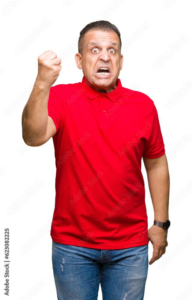 Middle age arab man over isolated background angry and mad raising fist frustrated and furious while shouting with anger. Rage and aggressive concept. Middle age arab man over isolated background angry and mad raising fist frustrated and furious while shouting with anger. Rage and aggressive concept.