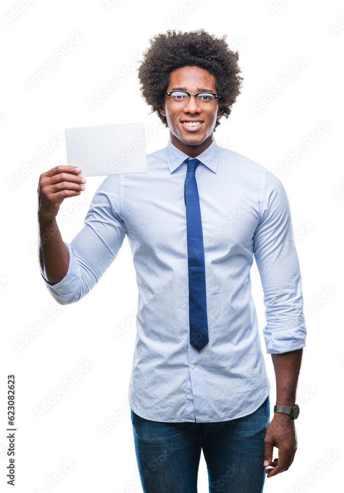 Afro american man holding blank card over isolated background with a happy face standing and smiling with a confident smile showing teeth Afro american man holding blank card over isolated background with a happy face standing and smiling with a confident smile showing teeth